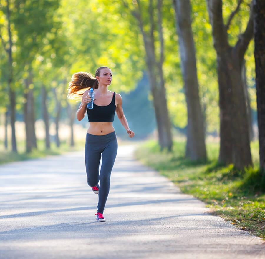 Woman jogging on pathway