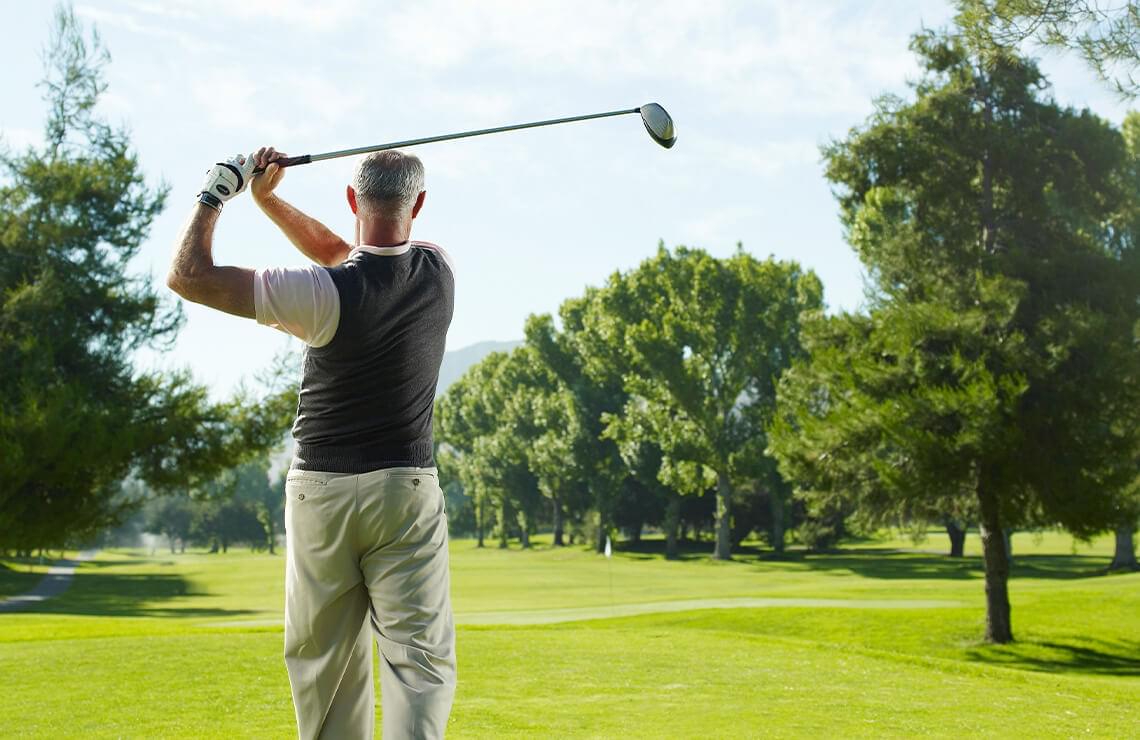 Man golfing