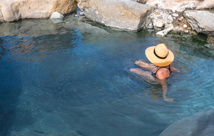 Person sitting in spa