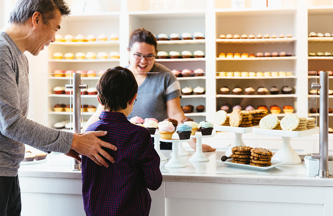 Child inside cupcake store