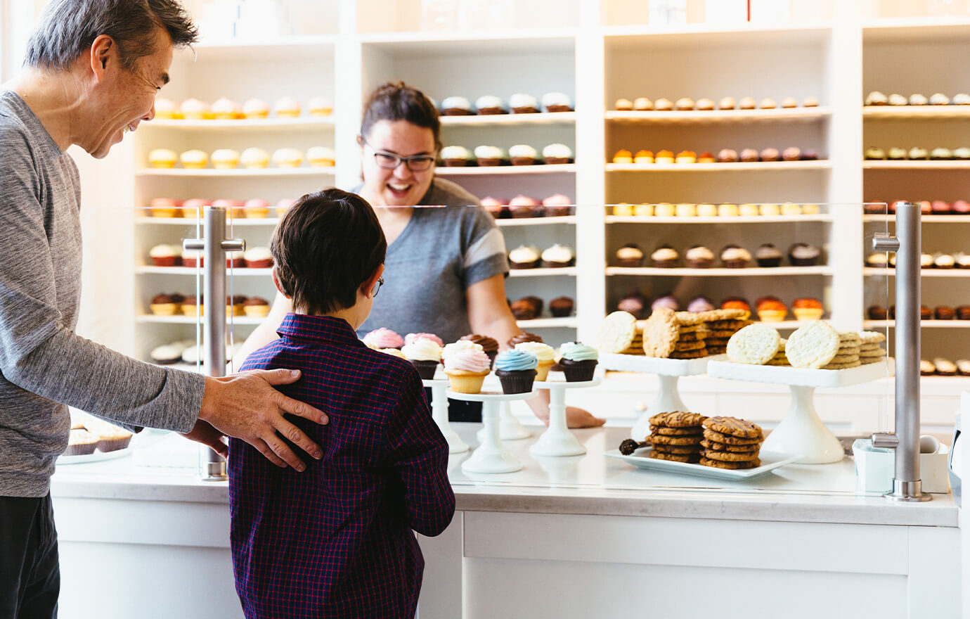 Child inside cupcake store