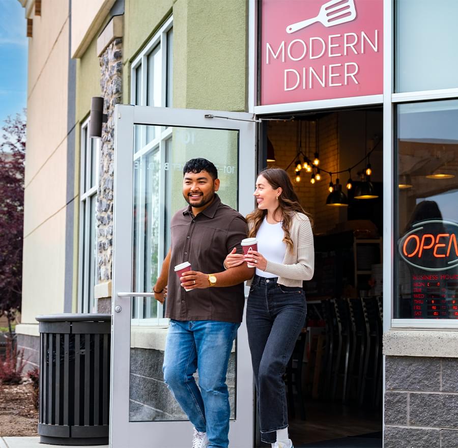 Man and woman having coffee at cafe
